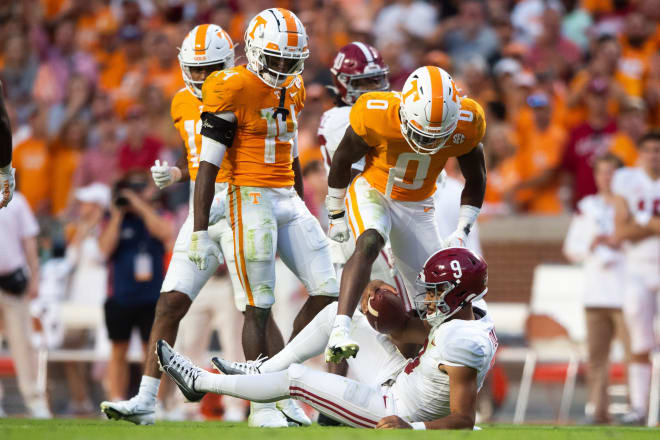 Tennessee defensive back Doneiko Slaughter stands over Alabama quarterback Bryce during the Vols' 52-49 win over the Crimson Tide on Oct. 15, 2022.