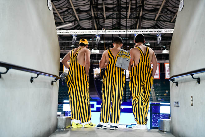 Black and gold striped 2024 overalls