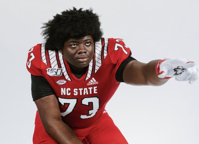 Huntington (W.Va.) High three-star offensive lineman Robby Martin verbally committed to NC State on Monday.