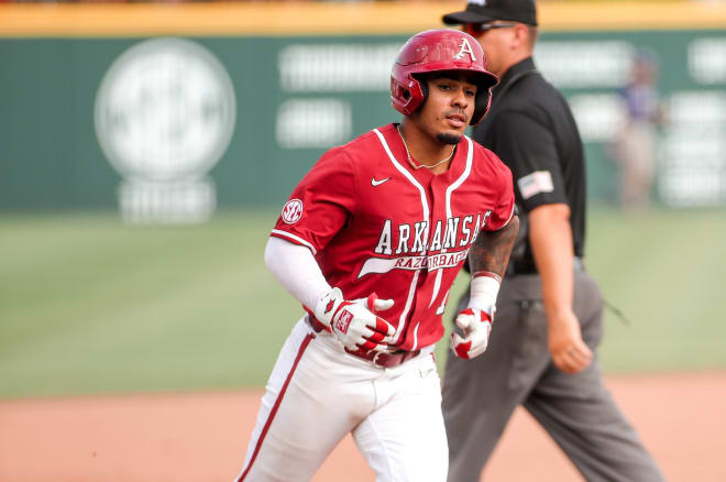 Arkansas infielder Harold Coll rounds third base during the loss to TCU on June 4.