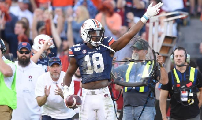 Seth Williams (18) celebrates his one-handed, first-down catch during Auburn vs. Alabama.