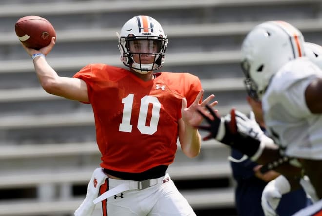Bo Nix (10) aims to throw during Auburn's first fall scrimmage.