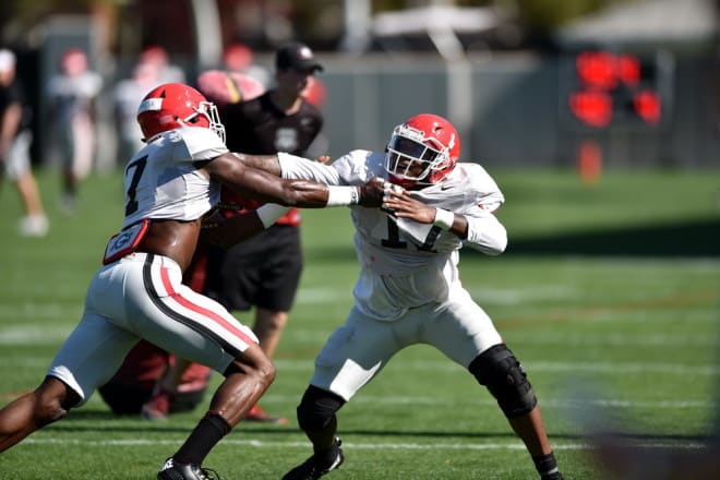 Lorenzo Carter (left) says the team has focused much of its spring to getting better in the red zone.