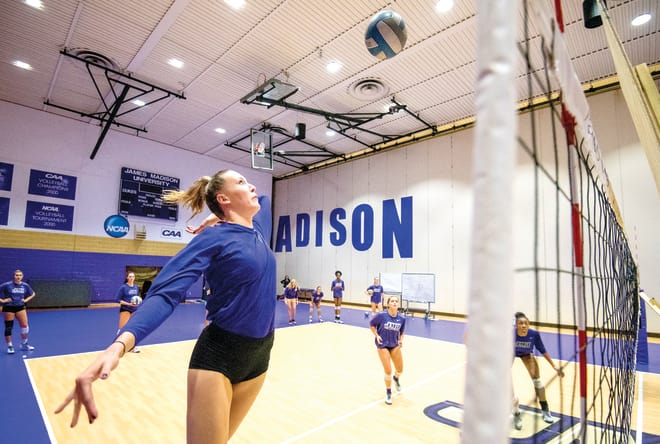 Janey Goodman strikes the ball during a James Madison practice in October.