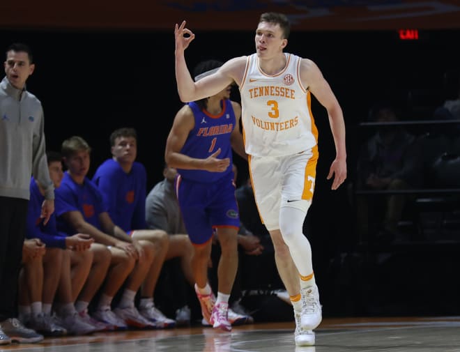 Jan 16, 2024; Knoxville, Tennessee, USA; Tennessee Volunteers guard Dalton Knecht (3) reacts after shooting a three pointer against the Florida Gators during the first half at Thompson-Boling Arena at Food City Center.