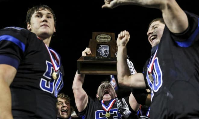 Devin O'Rourke (left) and teammates celebrate the state championship.