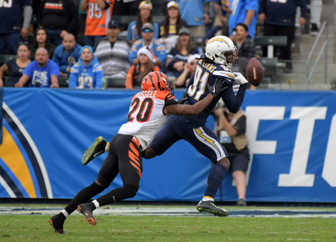 Cincinnati Bengals KeiVarae Russell defending Los Angeles Chargers wide receiver Mike Williams during a 26-21 loss.