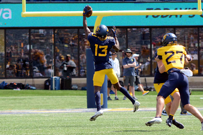 Finding a way to make difficult catches will be key for the West Virginia wide receiver room.
