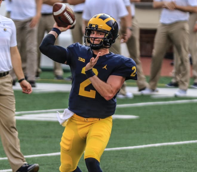 Michigan senior quarterback Shea Patterson has been battling an oblique injury suffered during the first play of the season.