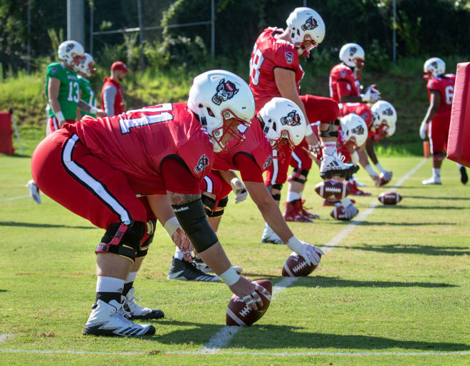Redshirt sophomore Joseph Sculthorpe (front) is sure to start on the interior of the offensive line.