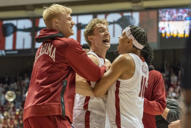 Alabama Crimson Tide guard Adam Cottrell (30) celebrates with guard Dominick Welch (10) after defeating LSU Tigers at Coleman Coliseum. Photo | Marvin Gentry-USA TODAY Sports