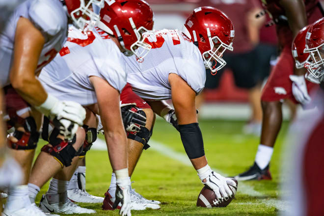 Arkansas offensive line, Beaux Limmer at center.