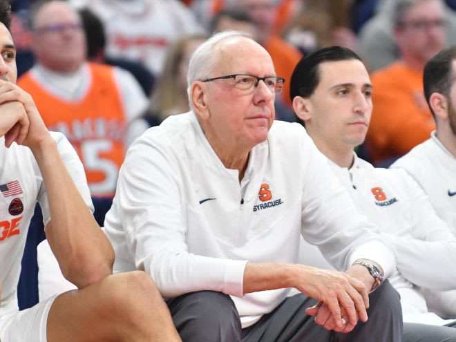 Feb 28, 2023; Syracuse, New York, USA; Syracuse Orange head coach Jim Boeheim and center Jesse Edwards (left) watch play in the second half against the Georgia Tech Yellow Jackets at the JMA Wireless Dome. Mandatory Credit: Mark Konezny-USA TODAY Sports