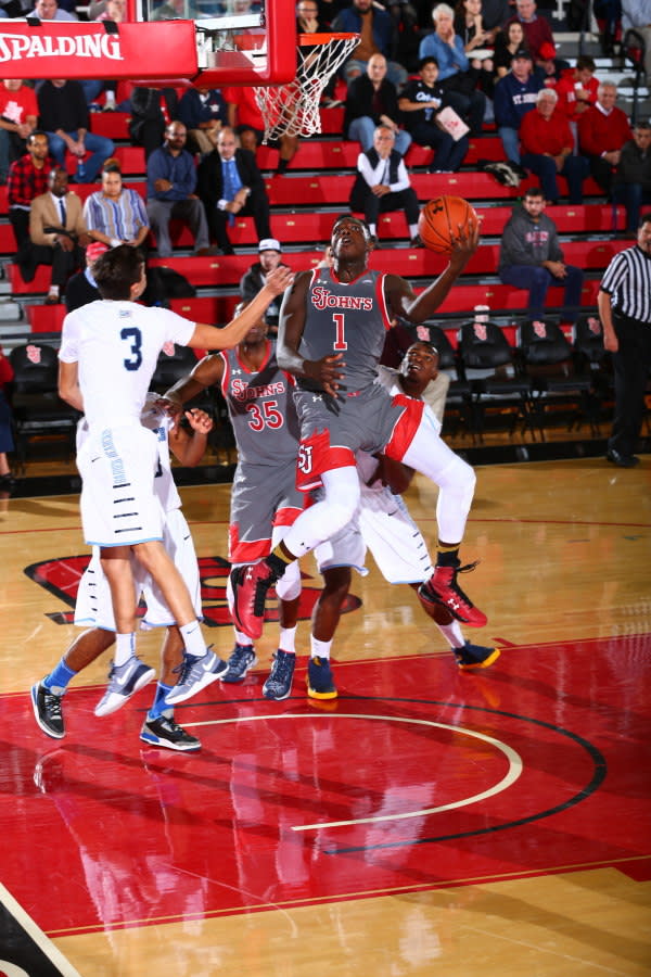 Bashir Ahmed gets to the rim