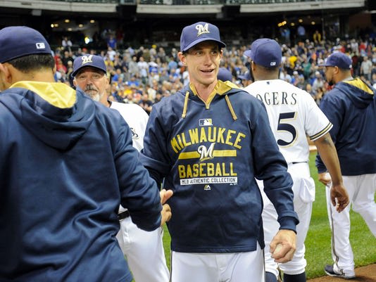 Counsell led the Brewers to the playoffs for the second straight season.