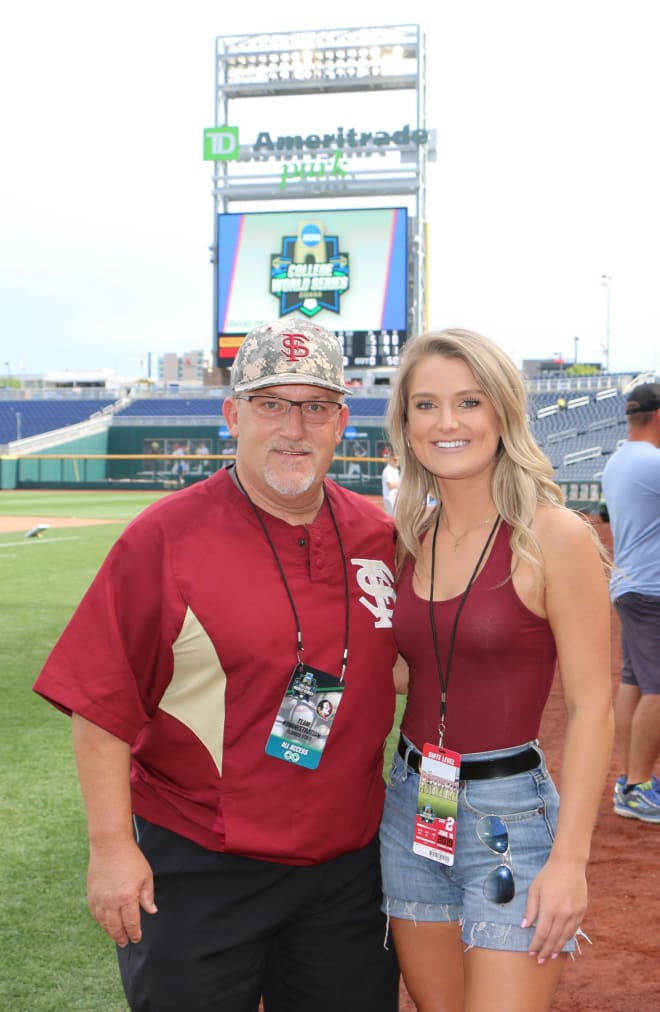 Chip Baker poses with his daughter Katie at TD Ameritrade this week. 