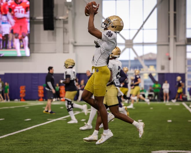 Grad senior cornerback Cam Hart grabs a pass during a non-contact drill at a recent Notre Dame spring football practice. 