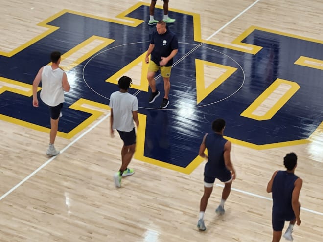 The Notre Dame men's basketball team warms up for a summer workout Tuesday at Rolfs Athletics Hall on the ND campus.