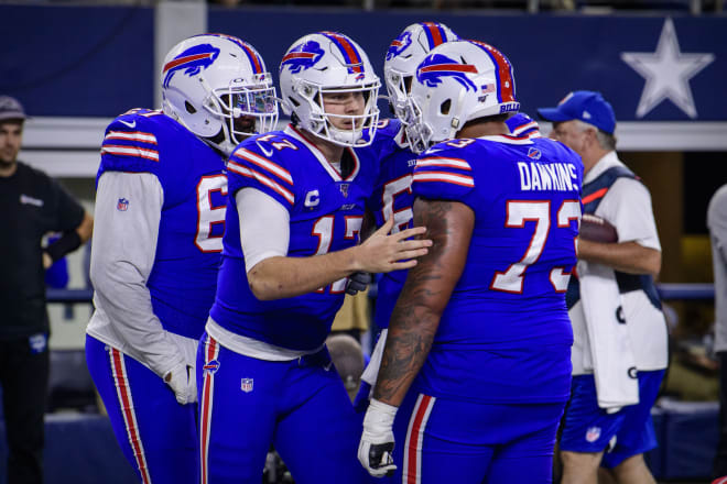 Quinton Spain (left) and the Bills came up with a win over the Cowboys on Thanksgiving.