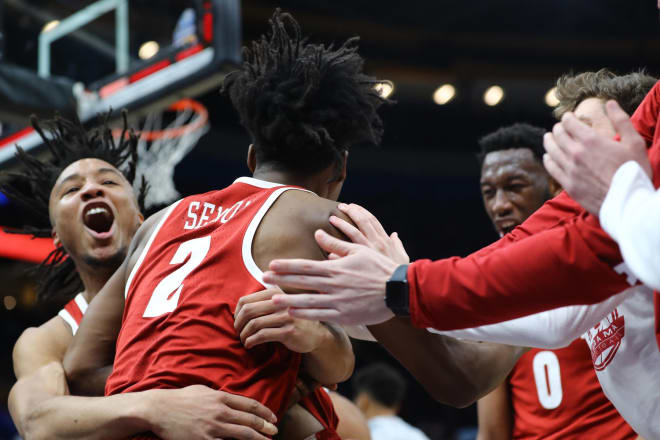 Alabama Crimson Tide guard Collin Sexton (2) is mobbed by teammates after hitting the game-winning shot against the Texas A&M Aggies in the second round of the SEC Conference Tournament at Scottrade Center. Photo | USA Today