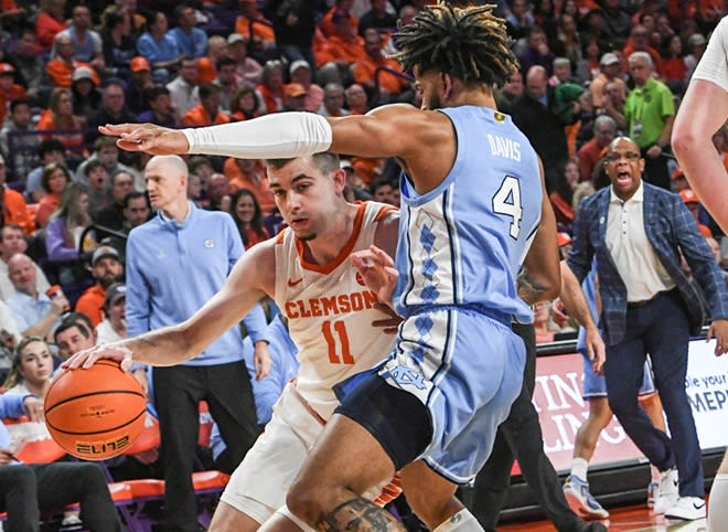 The Tar Hees shut down Clemson starts Joseph Girard (pictured) and P.J. Hall.