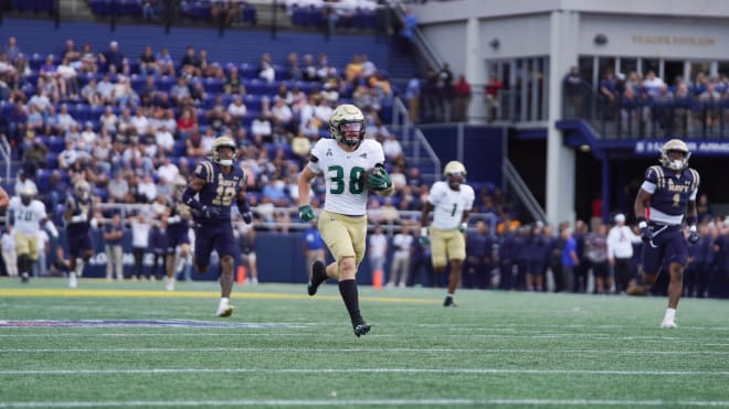 Sean Atkins parts the Navy secondary for a long touchdown