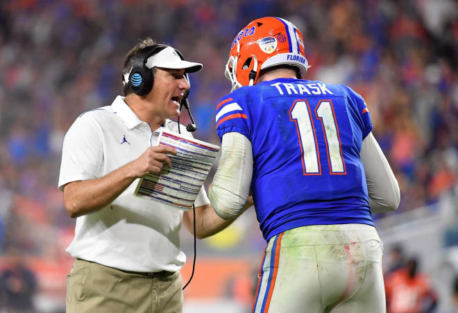 Florida coach Dan Mullen (left) with quarterback Kyle Trask (right) in the Orange Bowl. 