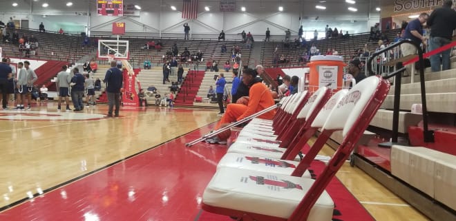 The state's top talent in 2022 (Jalen Washington) missed almost his entire season with an ACL injury. Washington looks on during his team's warmups on December 14 at the Southport Shootout.