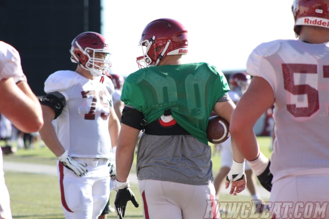 Ty Clary was still in green at Wednesday's practice.