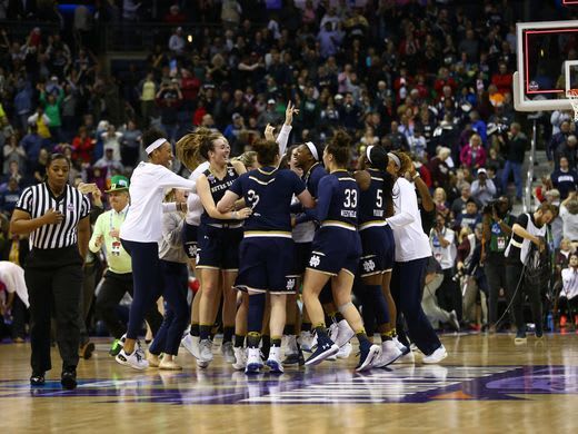 Notre Dame celebrates its upset of No. 1 UConn to advance to the national title game.