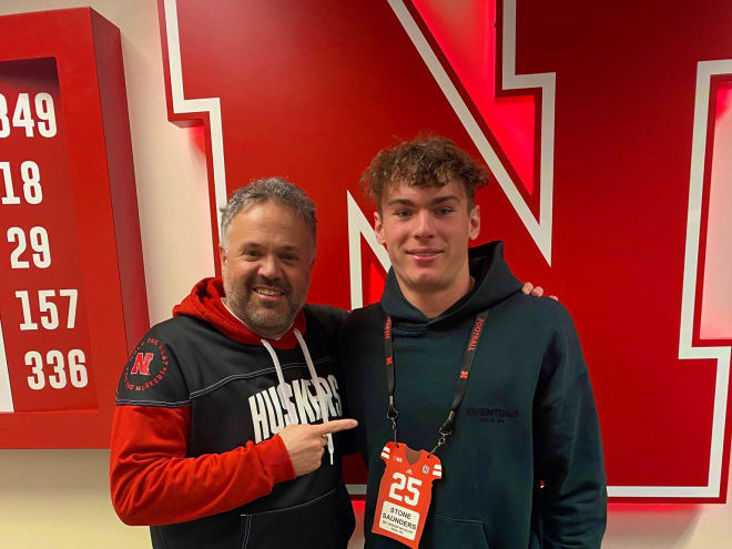 Matt Rhule and 2025 four-star QB Stone Saunders