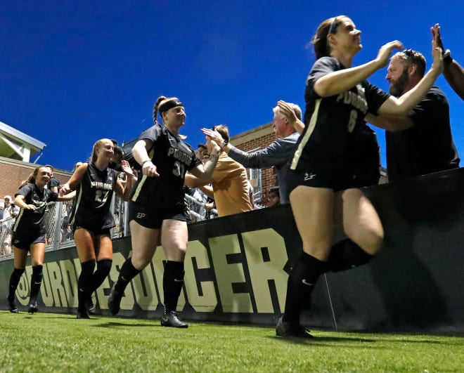 Purdue Boilermakers high five fans after the NCAA women s soccer game against the University of Southern California Trojans, Thursday, Aug. 18, 2022, at Folk Field in West Lafayette, Ind. Purdue won 3-0. 