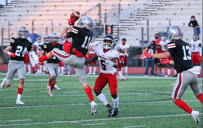 Chief Collins (#11) making a play on the ball