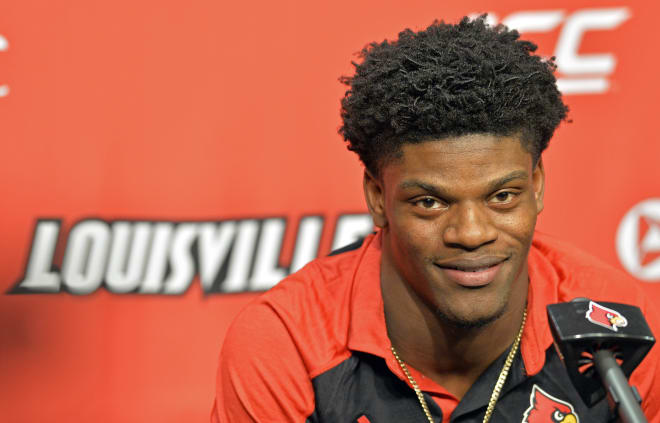 Heisman Trophy finalist Lamar Jackson, answers a question during a press conference, Monday, Dec. 5, 2016, in Louisville, Ky. The Heisman Trophy, awarded to college football's outstanding player each year, will be awarded to one of the five finalists on Saturday at the Downtown Athletic Club in New York. (AP Photo/Timothy D. Easley)