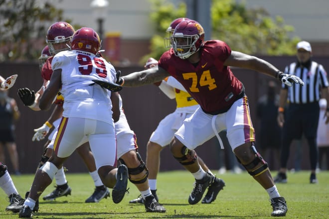 Sophomore left tackle Courtland Ford goes against junior outside linebacker Drake Jackson in practice this month.