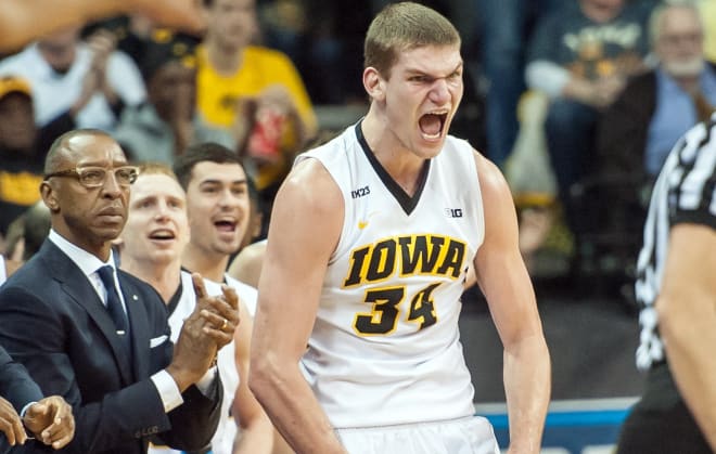 Adam Woodbury had 13 points and 10 rebounds for the Hawkeyes.