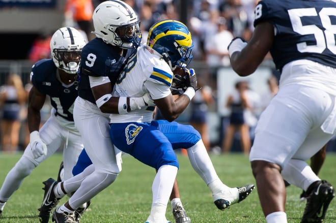 Penn State safety King Mack (9) tackles Delaware running back Saeed St. Fleur during the second half of an NCAA football game Saturday, Sept. 9, 2023, in State College, Pa. Photo | Dan Rainville / USA TODAY NETWORK