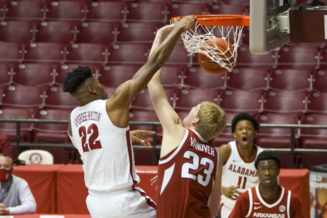 Alabama Crimson Tide forward Keon Ambrose-Hylton (22) dunks against Arkansas Razorbacks forward Connor Vanover (23) during the second half at Coleman Coliseum. Photo | Imagn