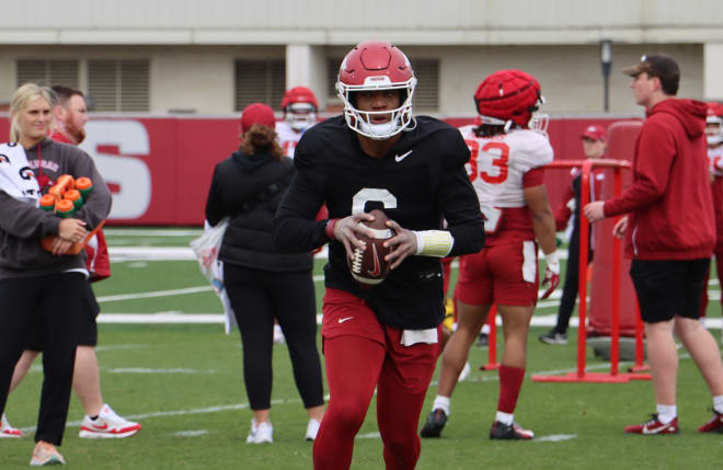 Arkansas quarterback Jacolby Criswell runs through option drills during spring practice.