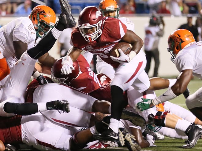 David Williams bucks his way in for his second touchdown in his first game as a Razorback