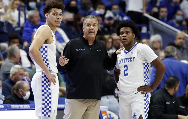 Kentucky coach John Calipari talked strategy with Kellen Grady and Sahvir Wheeler (2) during a recent game at Rupp Arena.