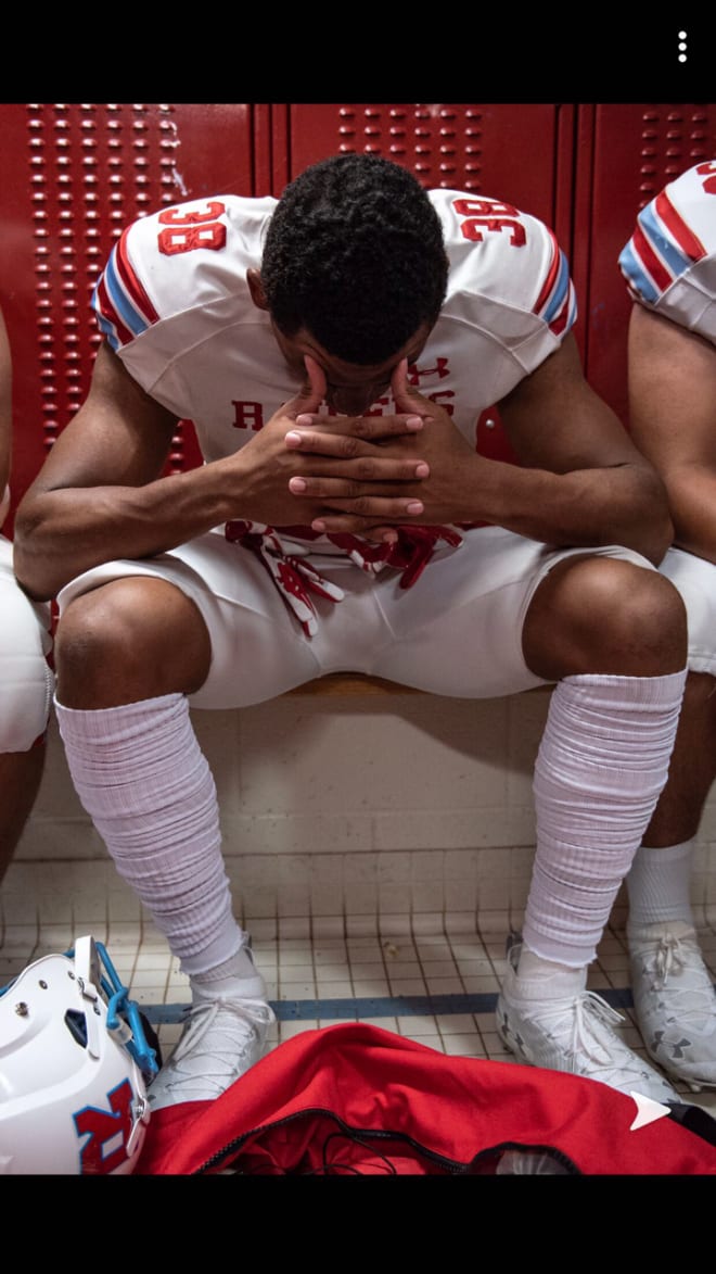 Runmmel LB Kolbe Fields sits inside a locker stall and mentally prepares before a game during the 2019 football season