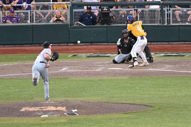 Sean Sullivan pitches against LSU's Jordan Thompson during the Men's College World Series. 