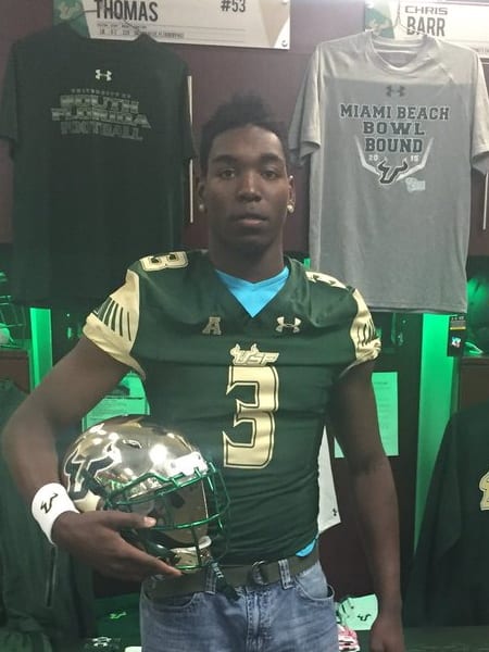Roundtree poses in the locker room during his USF visit