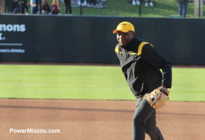 Gates threw out the first pitch at Mizzou's softball game on Friday night
