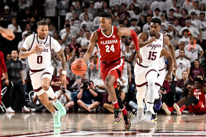 Alabama Crimson Tide forward Brandon Miller (24) dribbles the ball durning the first quarter against the Alabama Crimson Tide at Reed Arena. Photo | Maria Lysaker-USA TODAY Sports