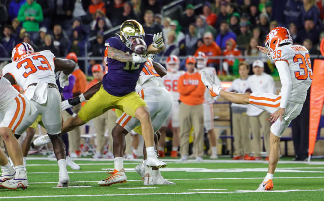 ND vyper end Jordan Botelho (12) blocks a punt during a 35-14 Irish upset win over Clemson on Nov. 5.