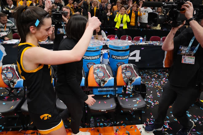 Iowa Hawkeyes guard Caitlin Clark (22) leaves the court after the NCAA Tournament championship basketball game at Rocket Mortgage Fieldhouse, Sunday, April 7, 2024 in Cleveland.