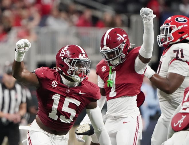 Alabama Crimson Tide linebacker Dallas Turner (15) and defensive back Kool-Aid McKinstry (1) celebrate after a stop on third down to force a Georgia Bulldogs field goal attempt at Mercedes-Benz Stadium. Photo | Gary Cosby Jr.-USA TODAY Sports