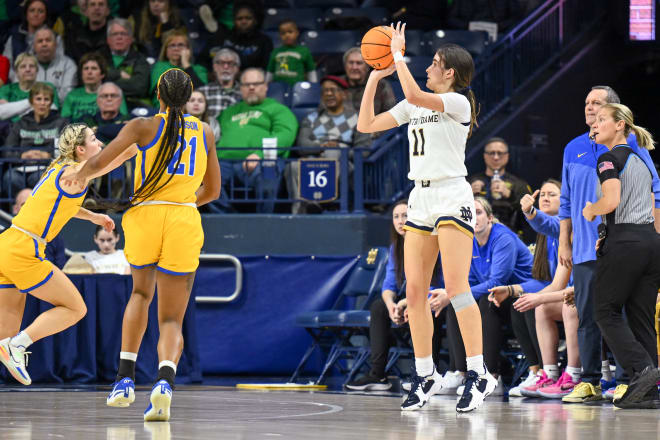 Sophomore Sonia Citron (11) fires in a 3-pointer for Notre Dame during its 69-63 home win over Pitt on Thursday night.
